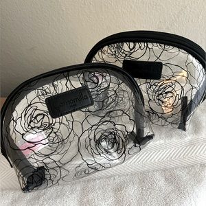 Two clear travel cosmetics bags.